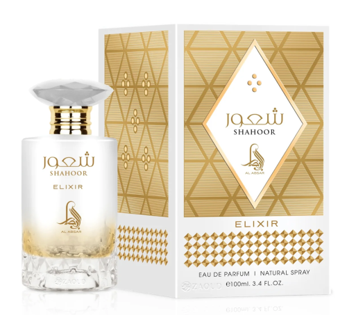 al-absar-Shahoor-Elixir-perfume-bottle-beside-box-against-white-background.PNG