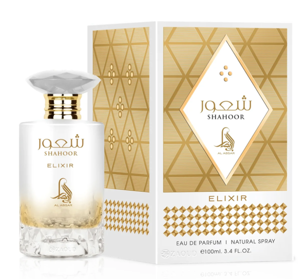 al-absar-Shahoor-Elixir-perfume-bottle-beside-box-against-white-background.PNG